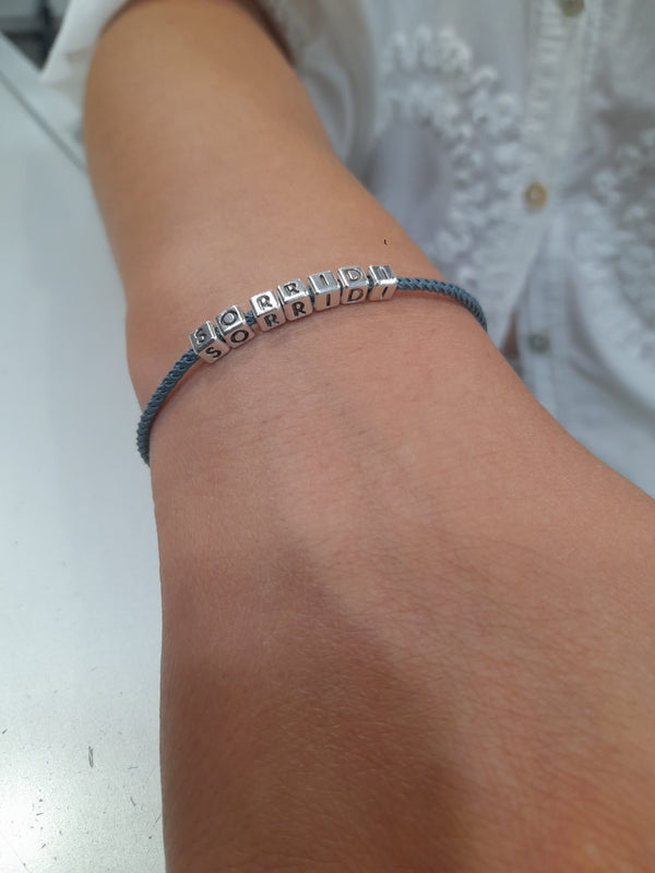 Bracciale lettere cubi 4 mm, a partire da €..