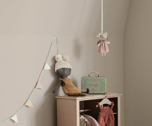 Topino angelo in valigia