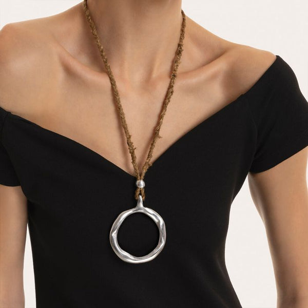 Pendente seta grezza cerchio