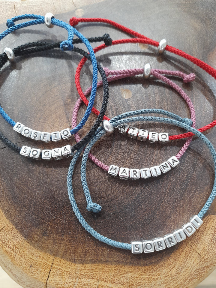 Bracciale lettere cubi 4 mm, a partire da €..